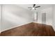 Spacious living room featuring hardwood floors, neutral walls, and stairs to the upper level at 3388 Elgin Dr, Decatur, GA 30032
