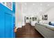 Modern entryway opens to living, kitchen and dining area with hardwood floors and lots of light at 3388 Elgin Dr, Decatur, GA 30032