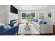 Inviting living room with a modern fireplace, comfortable seating, and ample natural light at 3388 Elgin Dr, Decatur, GA 30032