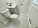 Bathroom featuring tile flooring and new grey vanity at 559 Allgood Rd, Stone Mountain, GA 30083