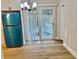Bright dining area with white blinds and views of backyard at 559 Allgood Rd, Stone Mountain, GA 30083