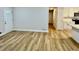 Spacious living room with vinyl floors, and modern finishes at 559 Allgood Rd, Stone Mountain, GA 30083