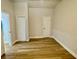 Well lit empty room with vinyl floors at 559 Allgood Rd, Stone Mountain, GA 30083