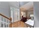 Bright foyer with hardwood floors, a vaulted ceiling and natural light at 6520 Fairfield Trce, Suwanee, GA 30024