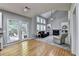 Open-concept living space that seamlessly combines the kitchen and main living room, with a vaulted ceiling at 6520 Fairfield Trce, Suwanee, GA 30024