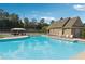A stunning community pool area offers relaxation and recreation, with lounge chairs and a gazebo at 6520 Fairfield Trce, Suwanee, GA 30024
