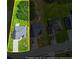 Aerial view of home featuring a well-maintained lawn, mature trees and a long driveway at 1890 Owens Trl, Rex, GA 30273