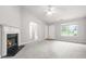 Living room featuring fireplace, lots of light, neutral walls and carpeting at 1890 Owens Trl, Rex, GA 30273