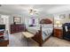 Spacious bedroom featuring a ceiling fan, dresser, natural light, and carpet at 1961 Luke Edwards Rd, Dacula, GA 30019