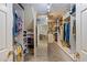 Walk-in closet with shelving, clothing and storage at 1961 Luke Edwards Rd, Dacula, GA 30019