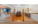 Elegant dining room featuring hardwood floors, coffered ceiling, and classic wainscoting at 1961 Luke Edwards Rd, Dacula, GA 30019