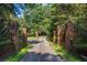 Wrought iron and brick entrance gate leading to a private estate, offering security and curb appeal at 1961 Luke Edwards Rd, Dacula, GA 30019