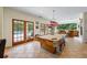 Entertain in the game room with a pool table and easy access to the outside pool at 1961 Luke Edwards Rd, Dacula, GA 30019
