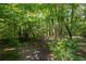 Gazebo in backyard surrounded by foliage at 1961 Luke Edwards Rd, Dacula, GA 30019