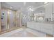 Main bathroom with shower, vanity and vintage stained-glass window at 1961 Luke Edwards Rd, Dacula, GA 30019