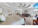 Spacious main bedroom with tray ceiling, sitting area, and a TV for added convenience at 1961 Luke Edwards Rd, Dacula, GA 30019
