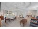 Expansive main bedroom featuring a tray ceiling, sitting area and neutral decor at 1961 Luke Edwards Rd, Dacula, GA 30019