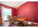 Formal dining room with classic wood furniture and chandelier lighting at 2302 Springside Way, Decatur, GA 30032