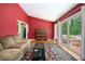 Bright living room with piano and sliding doors to outdoor patio at 2302 Springside Way, Decatur, GA 30032