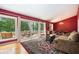 Spacious living room with hardwood floors, large windows, and a patio view at 2302 Springside Way, Decatur, GA 30032