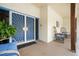 Inviting front porch featuring a decorative security door and two wicker chairs for relaxing outdoors at 2302 Springside Way, Decatur, GA 30032