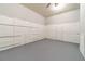 Clean basement featuring painted walls and a sealed concrete floor at 4120 Grady Smith Rd, Loganville, GA 30052