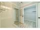Bathroom featuring glass shower and access to an airy walk-in closet at 4120 Grady Smith Rd, Loganville, GA 30052