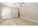 Bedroom with a ceiling fan and two closets at 4120 Grady Smith Rd, Loganville, GA 30052