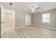 Bedroom with a ceiling fan, two windows and a closet at 4120 Grady Smith Rd, Loganville, GA 30052