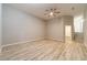 Bedroom with a ceiling fan and stairs to upper levels at 4120 Grady Smith Rd, Loganville, GA 30052