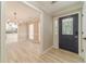 Home foyer leads to dining room and kitchen at 4120 Grady Smith Rd, Loganville, GA 30052