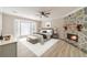 Comfortable main bedroom features stone fireplace and a large bay window at 4120 Grady Smith Rd, Loganville, GA 30052