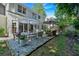Beautiful backyard with a large patio area, ideal for outdoor dining and entertaining at 4385 Pinehollow Court Ct, Alpharetta, GA 30022
