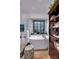 Spa-like bathroom featuring a soaking tub, glass shower, and stylish storage, creating a serene retreat at 4385 Pinehollow Court Ct, Alpharetta, GA 30022