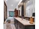 Elegant bathroom featuring a double vanity, freestanding tub, and herringbone-patterned tile for a luxurious feel at 4385 Pinehollow Court Ct, Alpharetta, GA 30022