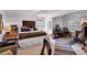 Bright bedroom with a cozy bed, large windows, and hardwood floors at 4385 Pinehollow Court Ct, Alpharetta, GA 30022