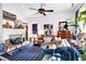 Bright and airy living room with a fireplace, modern decor, and comfortable seating area at 4385 Pinehollow Court Ct, Alpharetta, GA 30022