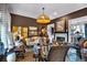 Elegant living room with a fireplace, stylish furnishings, and neutral color palette at 4385 Pinehollow Court Ct, Alpharetta, GA 30022