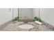 Bathroom featuring a granite countertop, modern fixtures, and decorative plants at 1410 Kingfield Dr, Johns Creek, GA 30005