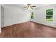 Bedroom featuring hardwood floors and natural light at 1410 Kingfield Dr, Johns Creek, GA 30005