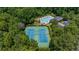 Aerial view of the neighborhood amenities including a pool and tennis courts at 1410 Kingfield Dr, Johns Creek, GA 30005