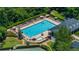 Community pool with plenty of room to lounge in the sun at 1410 Kingfield Dr, Johns Creek, GA 30005