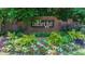 Beautiful landscaping at the brick entrance to Concord Hall at 1410 Kingfield Dr, Johns Creek, GA 30005