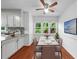 Cozy dining area with elegant table setting and abundant natural light at 1410 Kingfield Dr, Johns Creek, GA 30005
