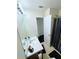 A bathroom with a shower and tub combination features a white sink and vanity at 7104 Georges Way, Morrow, GA 30260