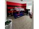 Fun room with red and black painted accent wall, bunk beds, and desk at 1731 Pryor Sw Rd # 307, Atlanta, GA 30315
