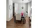 Dining room featuring dark hardwood floors and a modern chandelier above the table at 1731 Pryor Sw Rd # 307, Atlanta, GA 30315