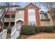 Charming townhome featuring brick accents, neutral siding, and well-maintained landscaping at 1731 Pryor Sw Rd # 307, Atlanta, GA 30315
