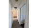 Second-floor hallway featuring plush carpet flooring and neutral-painted walls at 1731 Pryor Sw Rd # 307, Atlanta, GA 30315