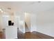 Open-concept living space featuring hardwood floors and light walls at 1731 Pryor Sw Rd # 307, Atlanta, GA 30315